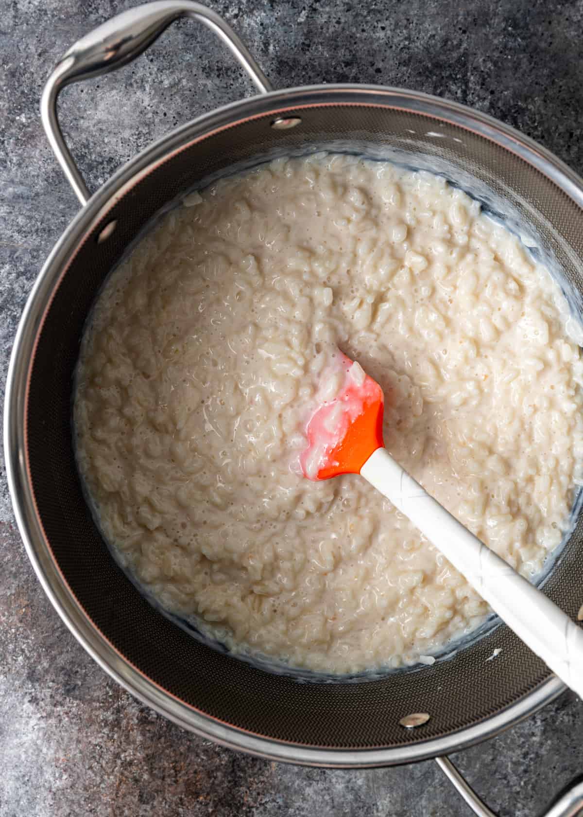 overhead: arroz con leche in a saucepan made with 4 cups of whole milk