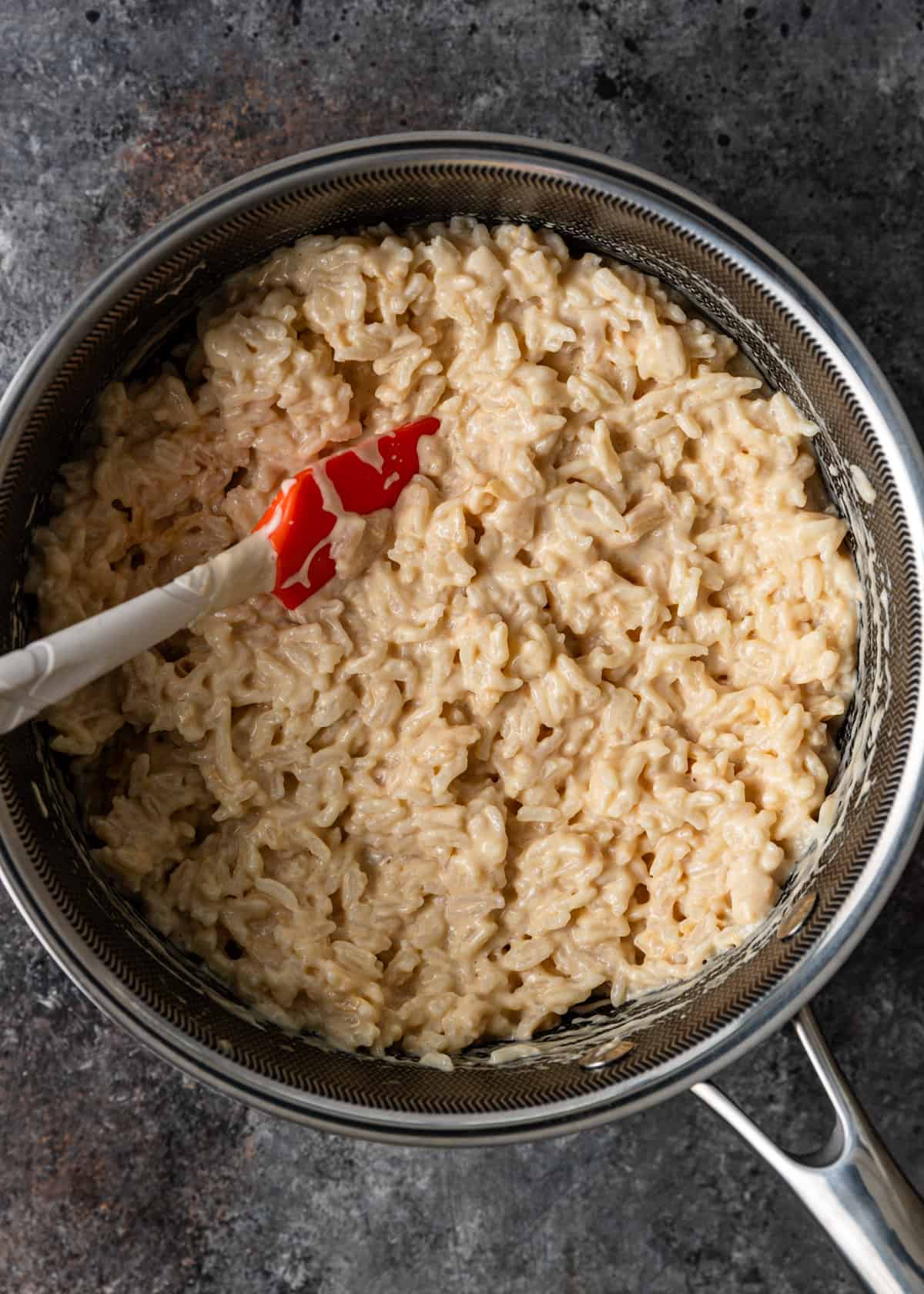 overhead: arroz con leche in a saucepan made with 3 milks
