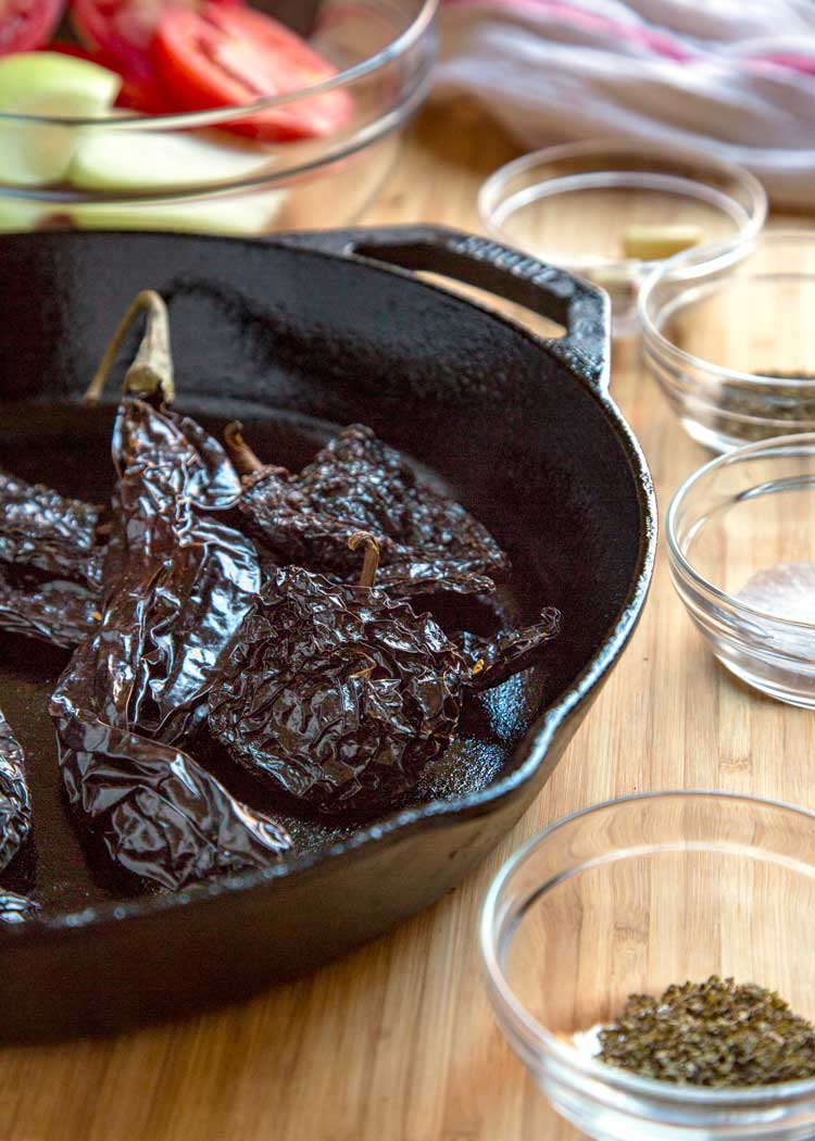 soaked chiles in cast iron skillet