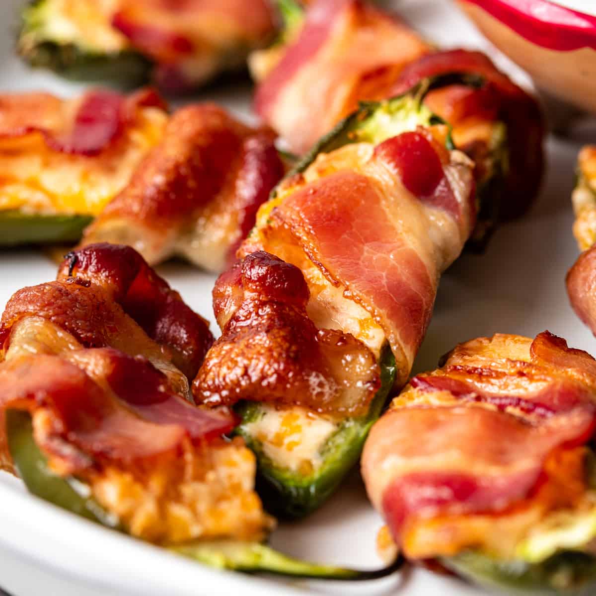 Bacon Wrapped Jalapeño Poppers on a platter