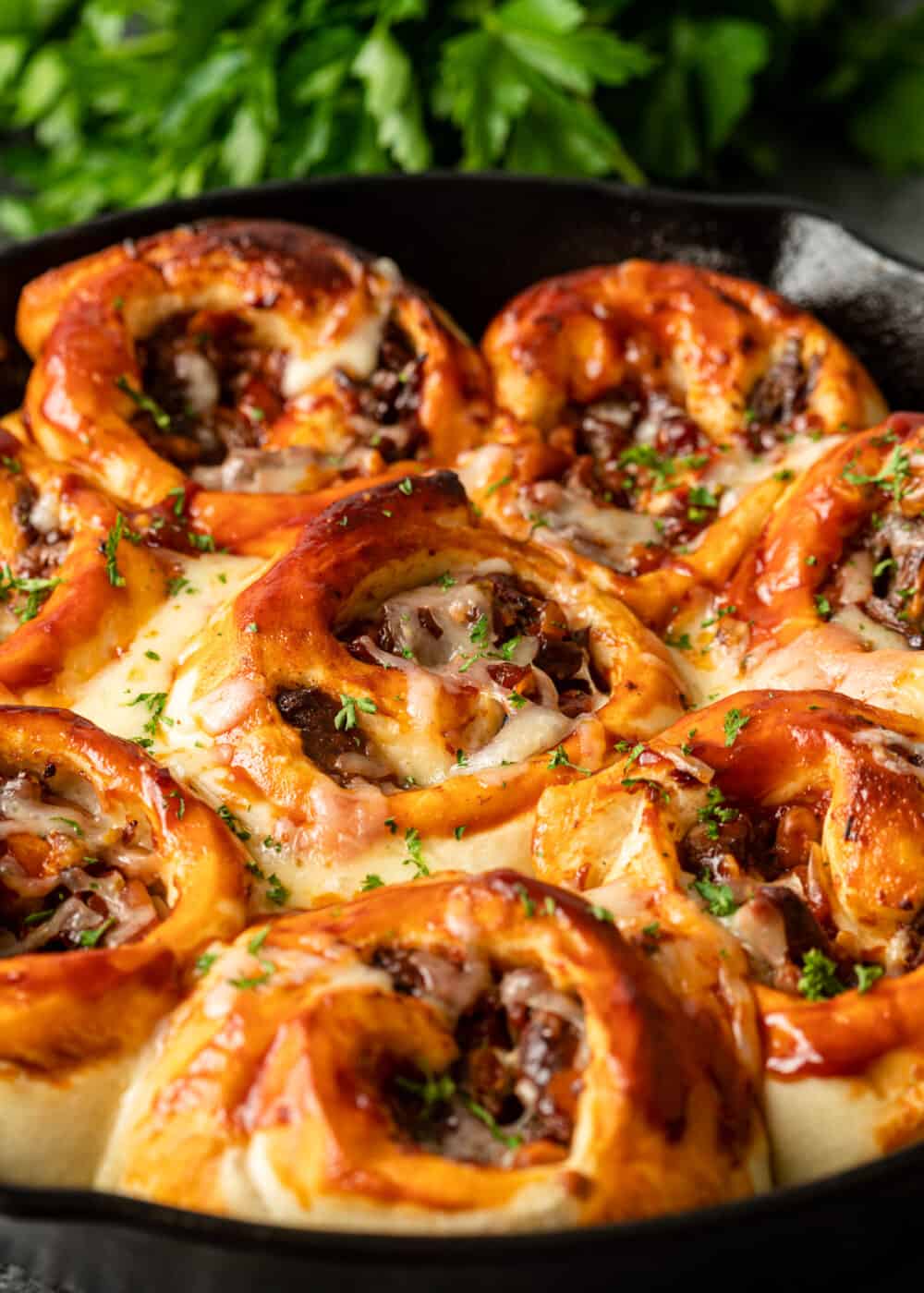 pan with cooked bbq beef rolls