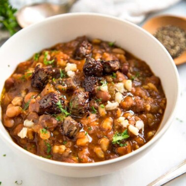 A bowl of barley beef soup