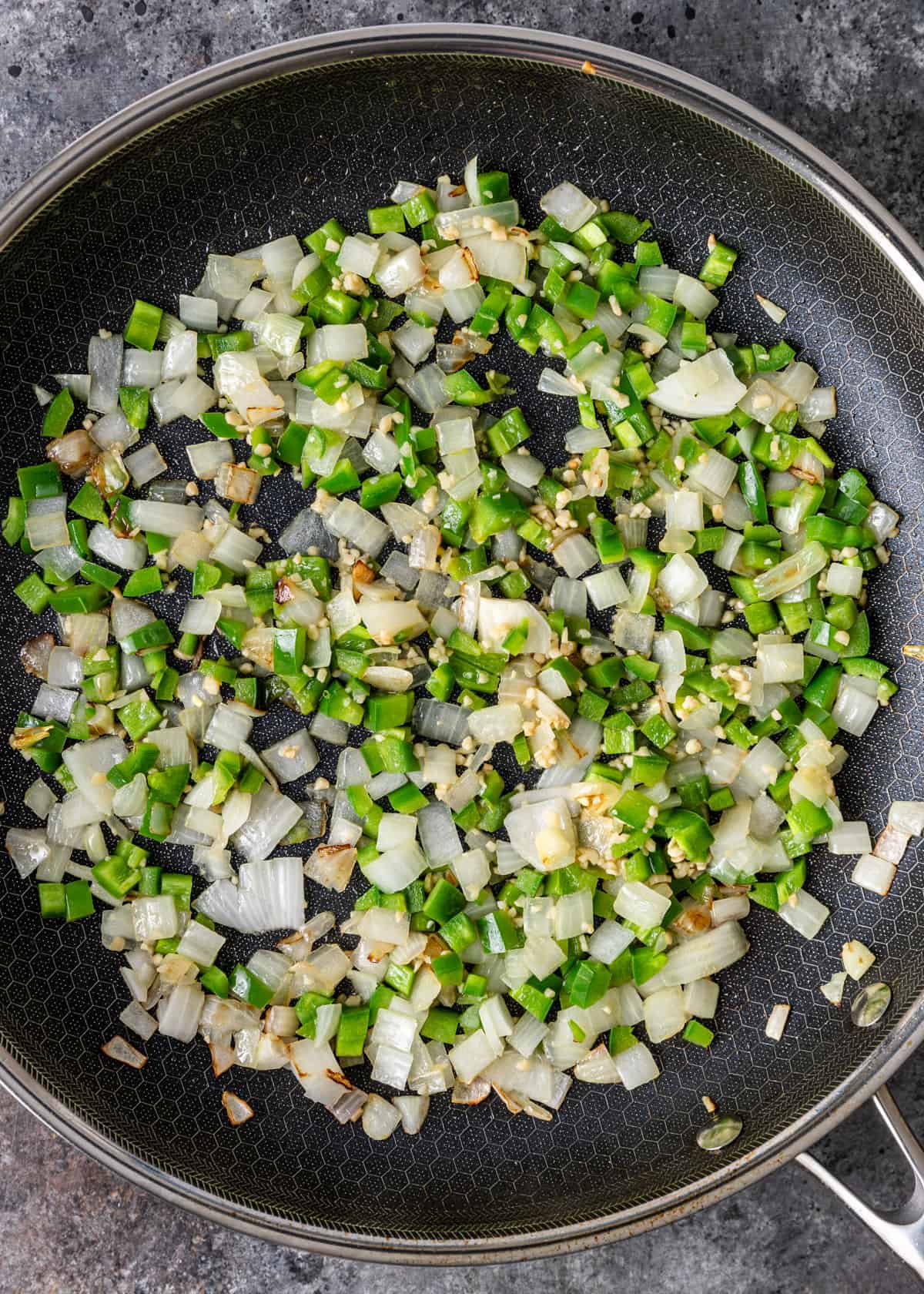 overhead: sautéing onions and peppers