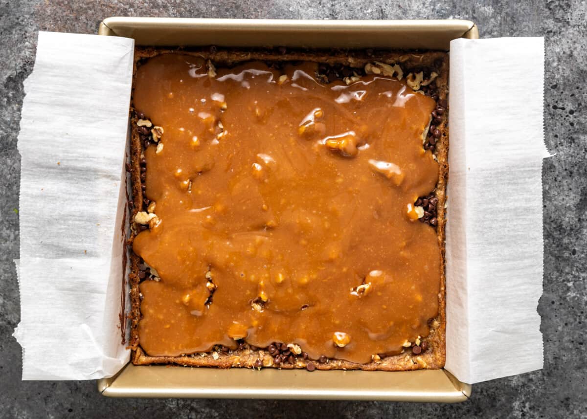overhead: added melted caramel in a baking pan