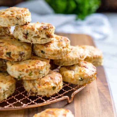 These Buttermilk Biscuits are loaded with bacon, green onion and Gruyere cheese, baked to a golden brown and perfect with soups, stews and holiday dinners.