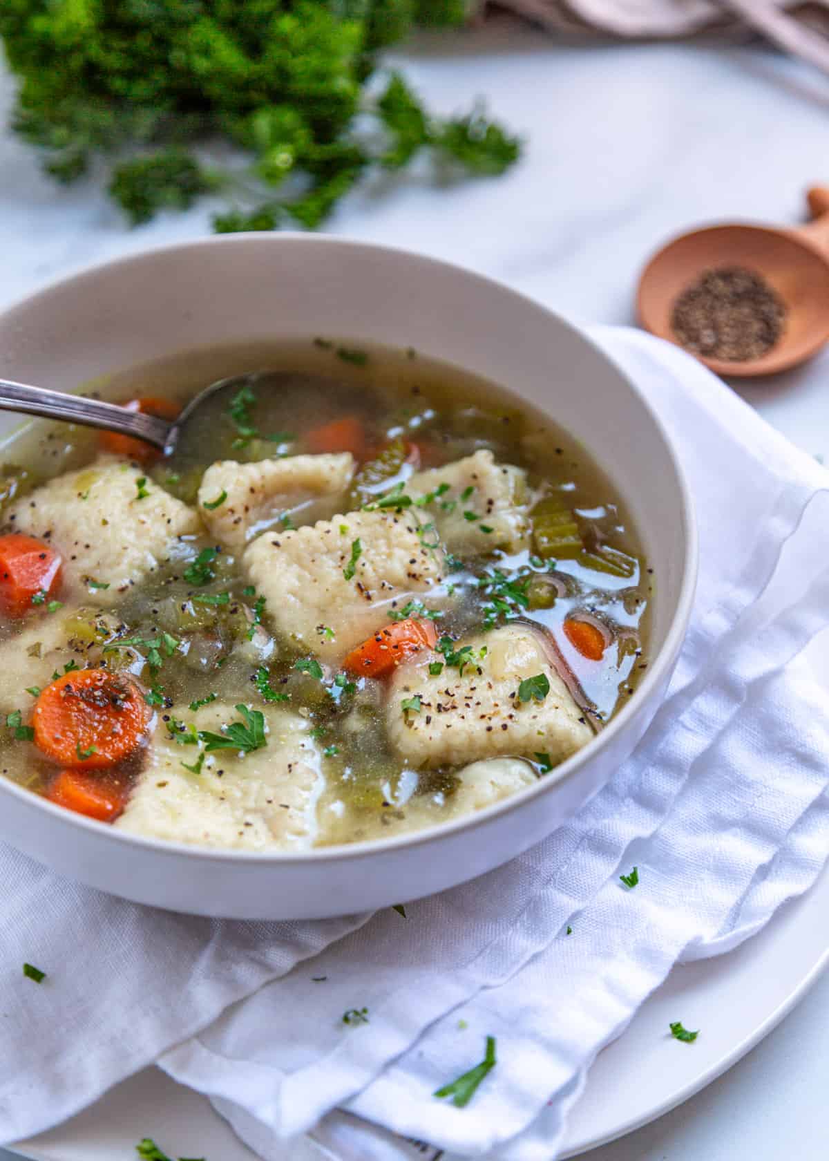 buttermilk dumplings in chicken broth with vegetables