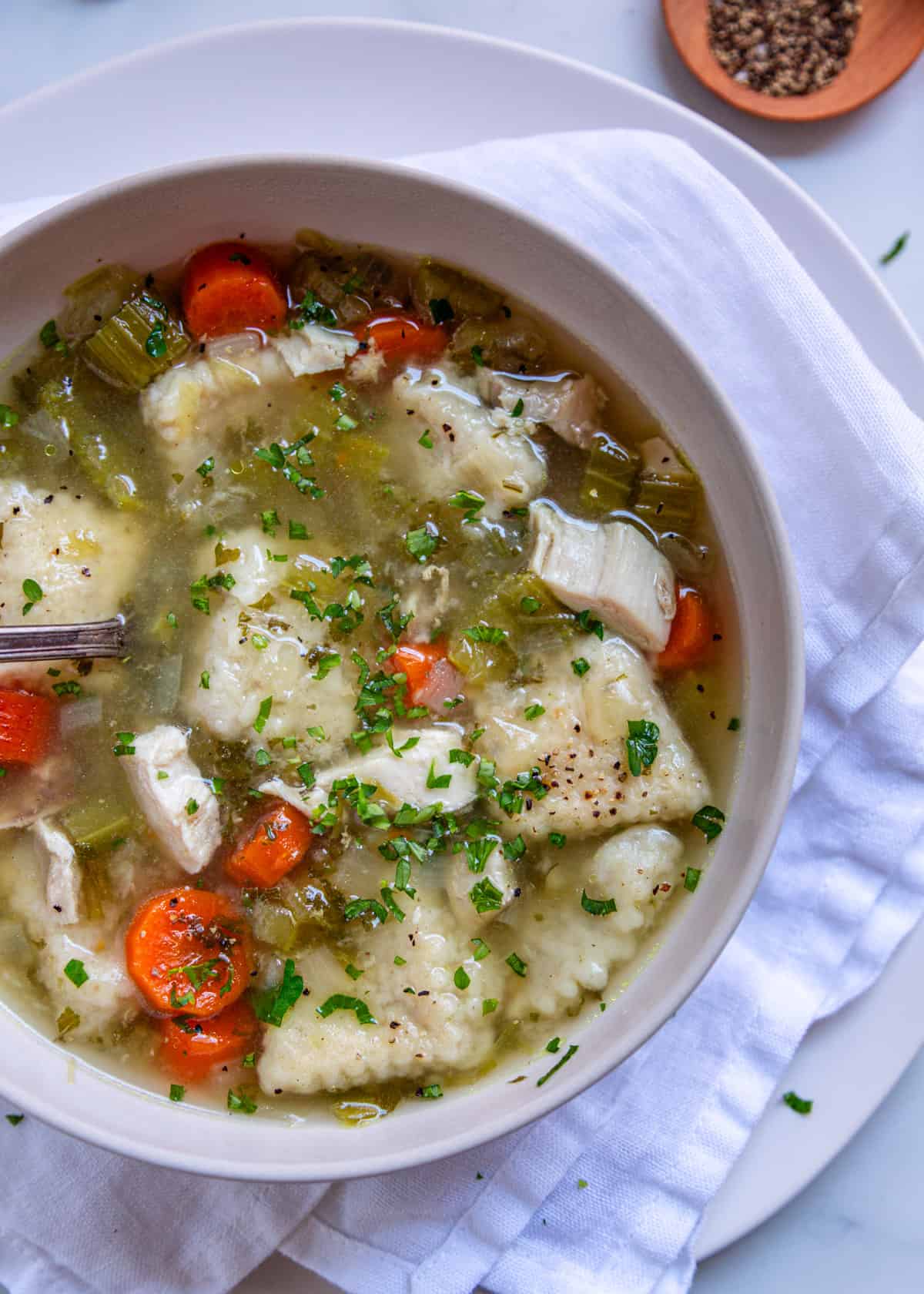 buttermilk dumplings in chicken broth with vegetables