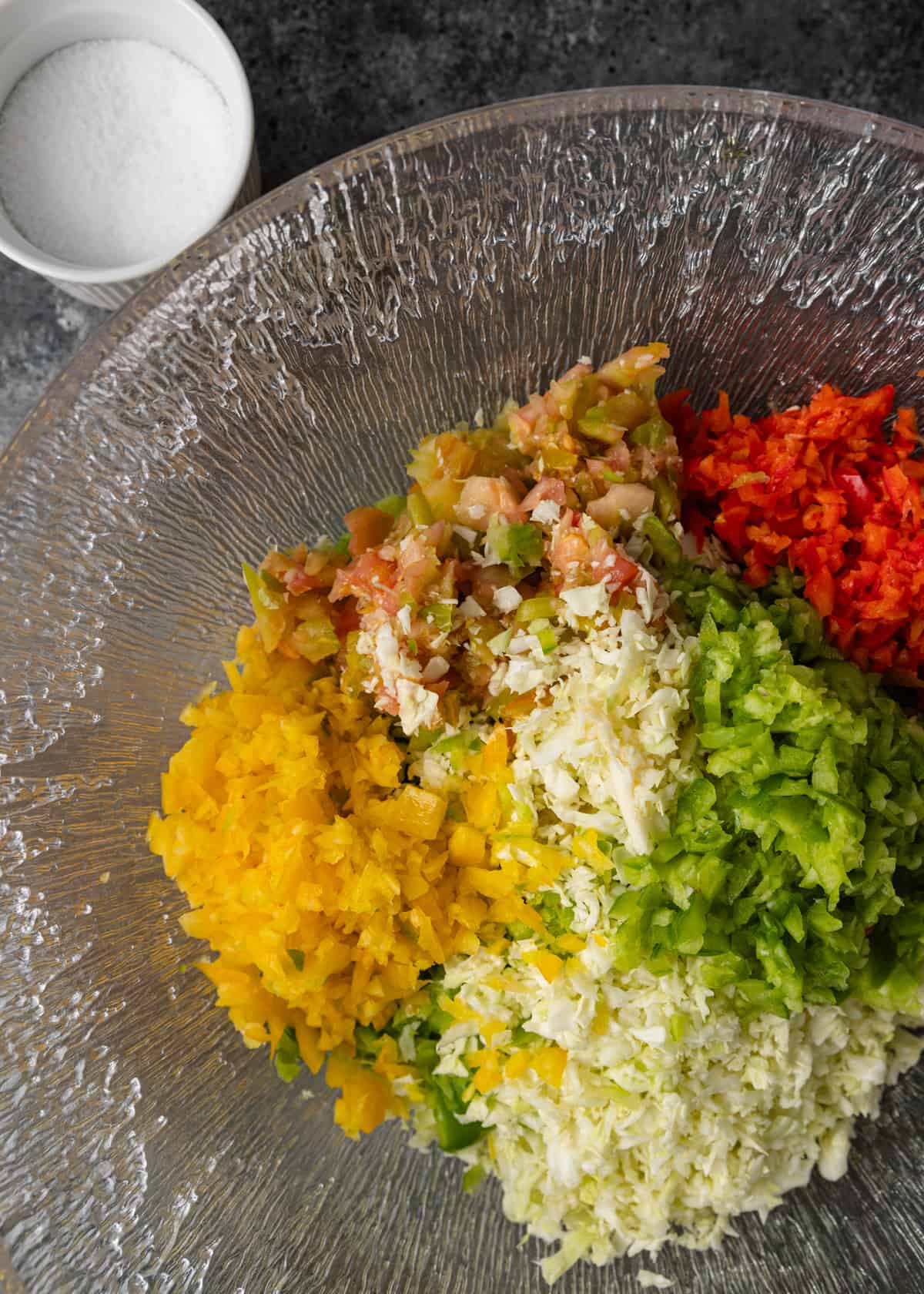 overhead: chopped Chow Chow relish ingredients in a bowl before mixing.