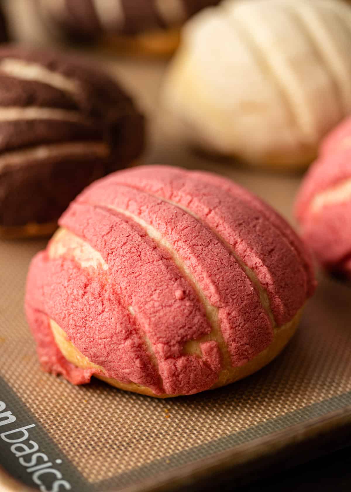 Close up of a pink pan dulce