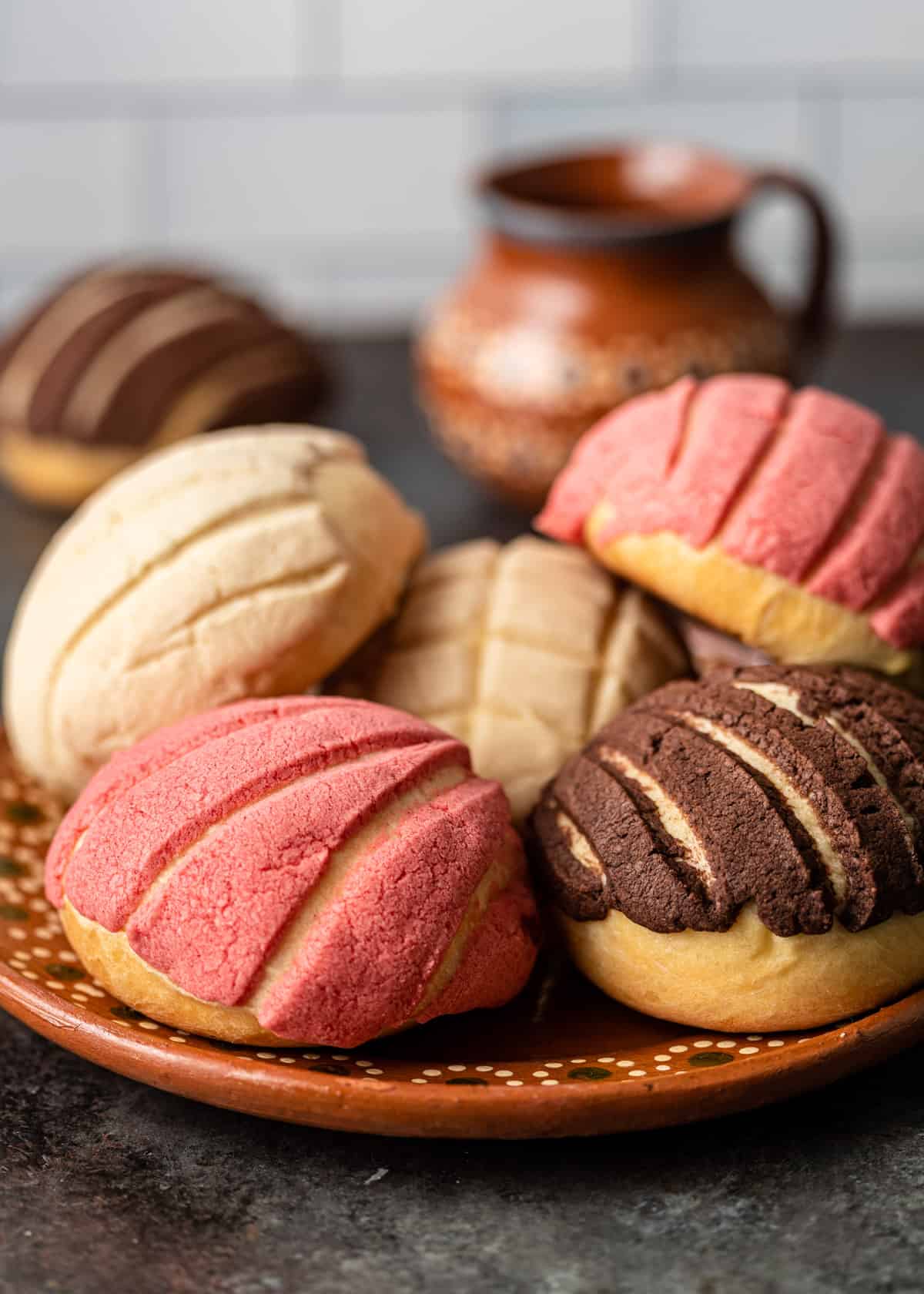 A plate of multi-colored conchas