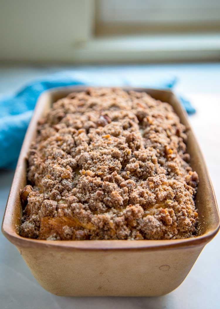 This tender Cranberry Nut Bread is the perfect way to wake up with a cup of coffee or tea. Loaded with cranberries and a crunchy cinnamon streusel topping. keviniscooking.com