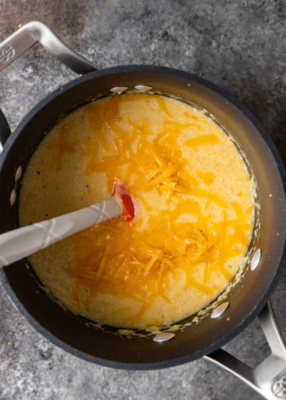 overhead image shows how to make grits in saucepan