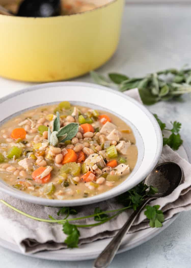 bowl of Green Chili Chicken and Beans with sage