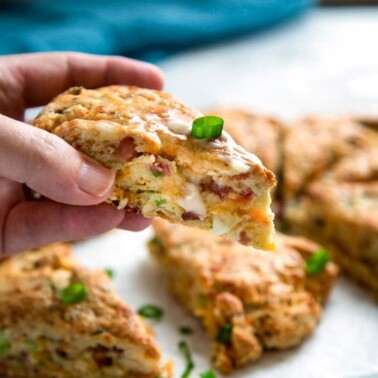 Warm, tender and flakey, these Ham and Cheese Scones make the most of any leftover holiday ham in a good way. keviniscooking.com
