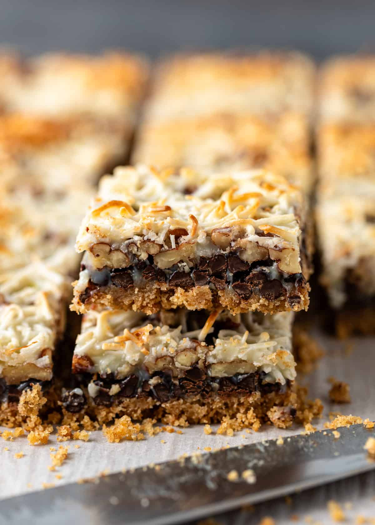 closeup: two hello Dolly bars stacked with layers showing