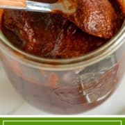 adobo sauce in jar with spoon