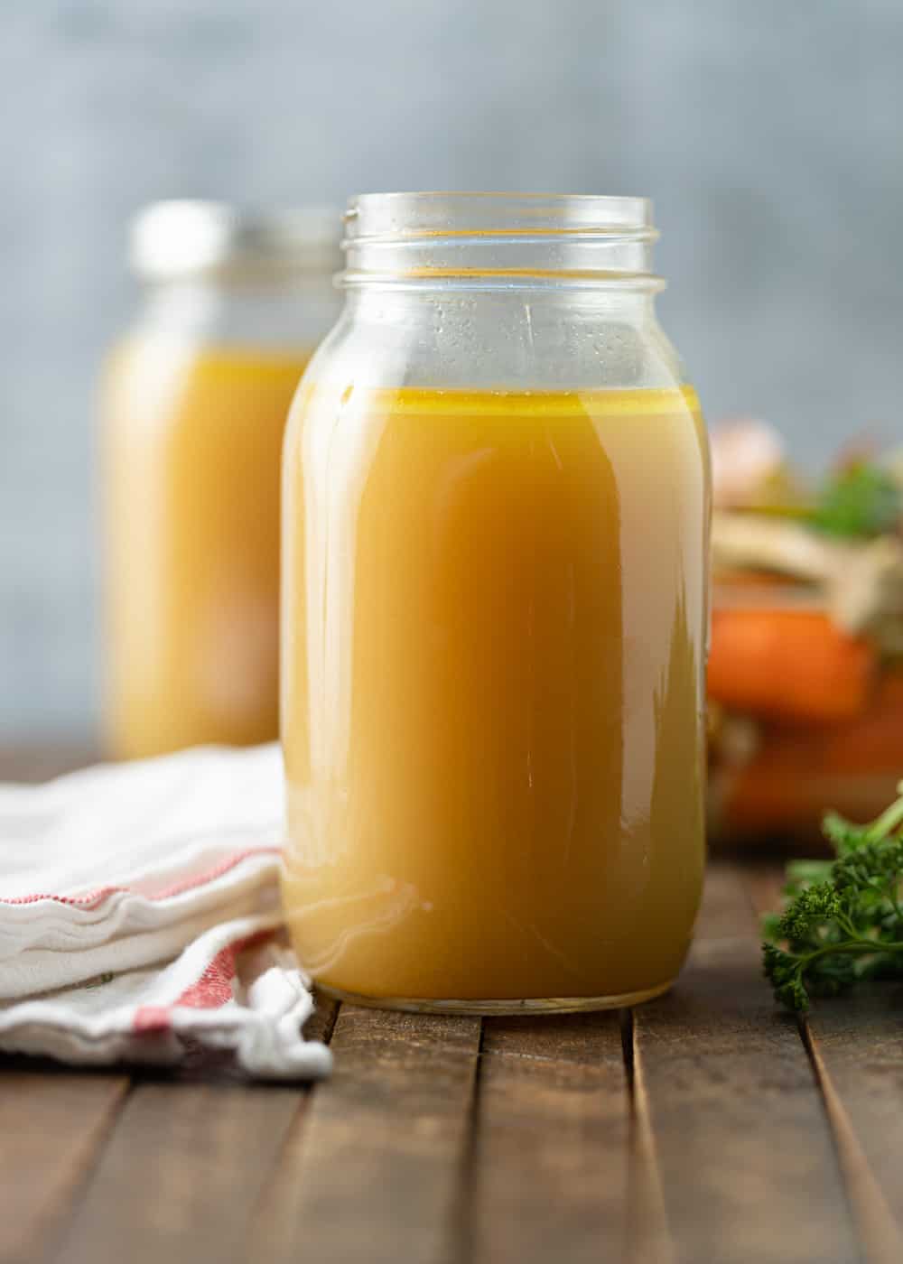 homemade broth in a large canning jar