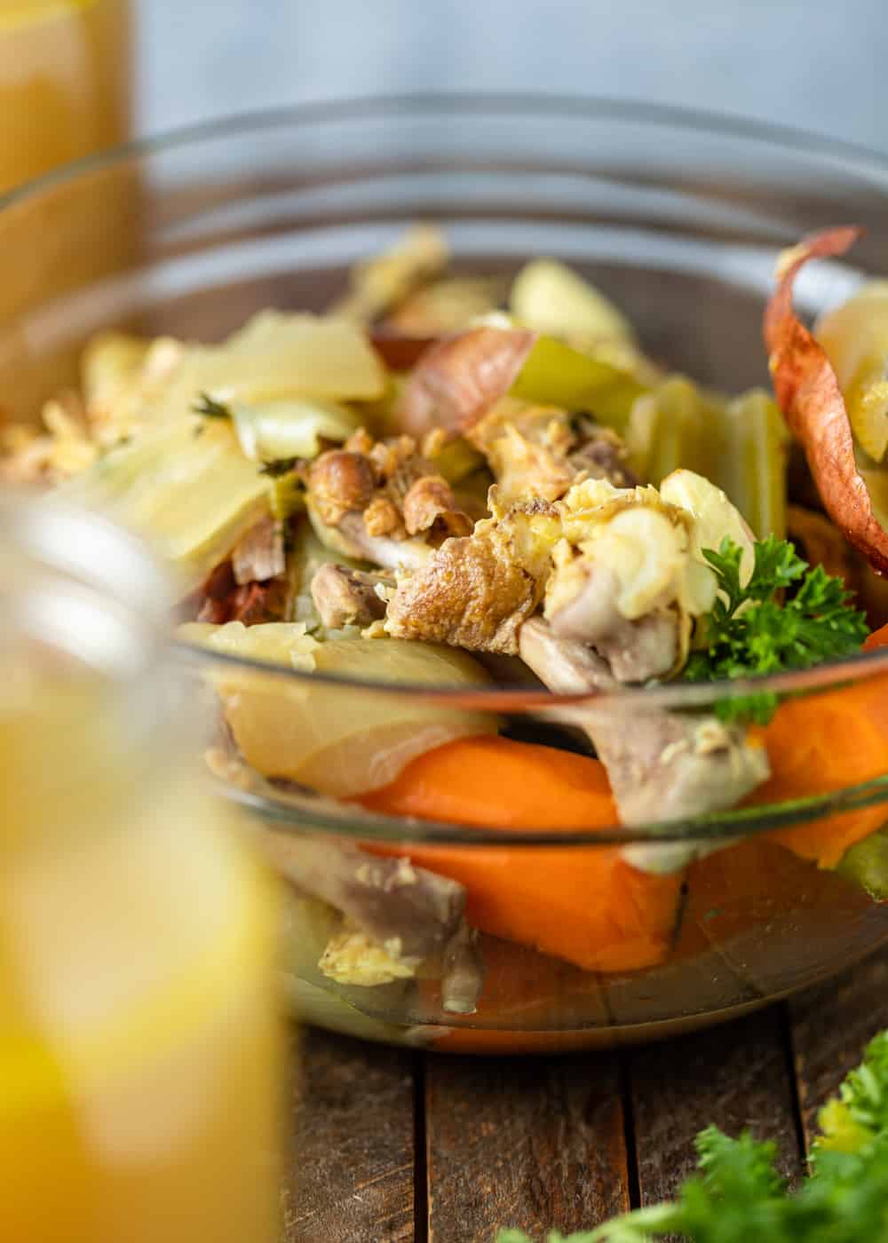 close up of chicken broth ingredients in a bowl