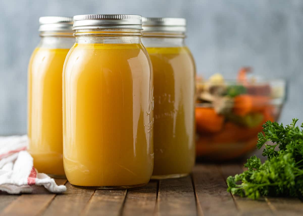 3 mason jars with homemade chicken broth