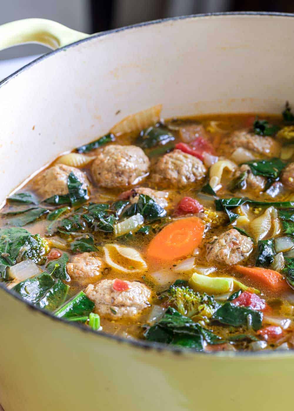 A pot of Meatball and vegetable Soup