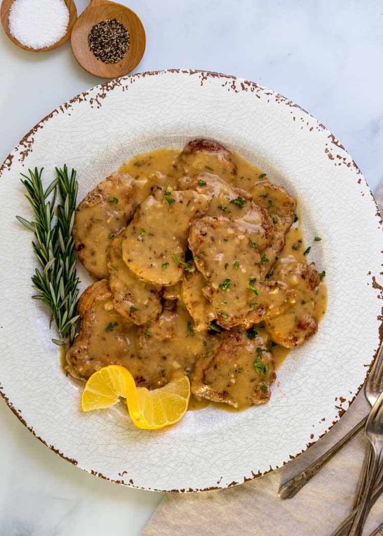 overhead plate of Lemon, Rosemary Pork Medallions