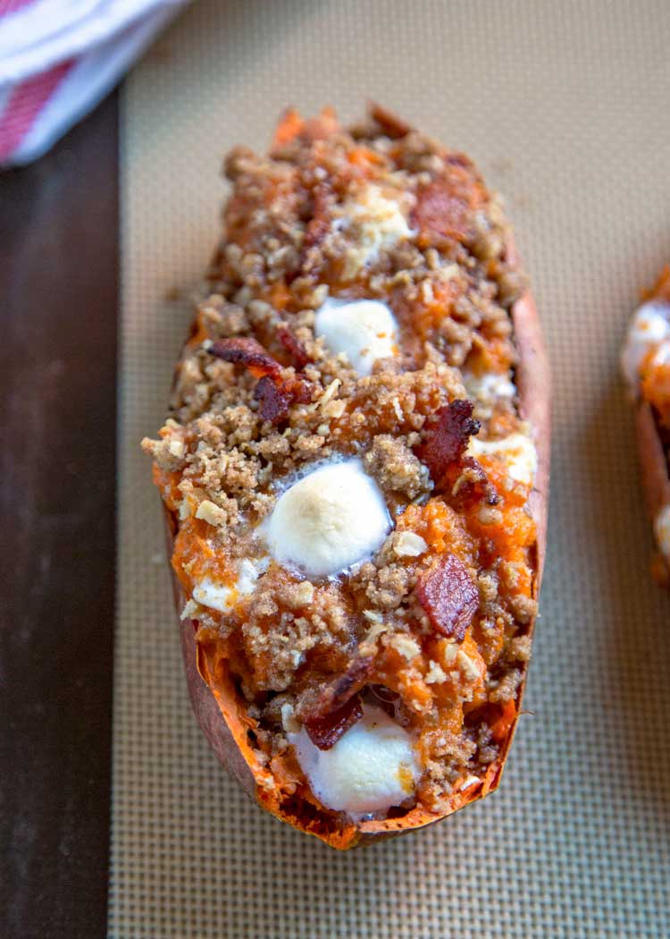 overhead: baked sweet potato with marshmallow, bacon, and streusel  topping