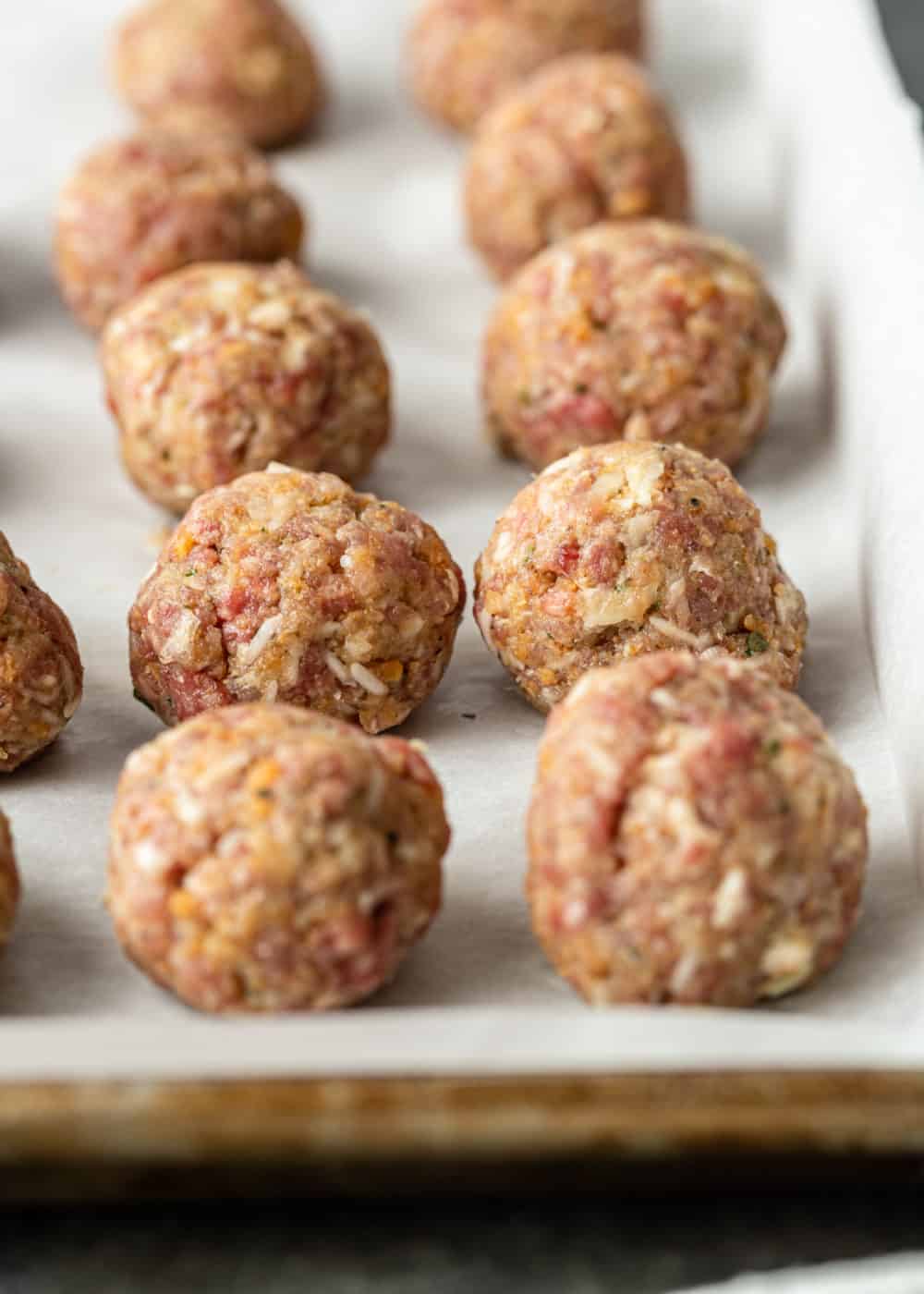 uncooked balls of ground pork and beef