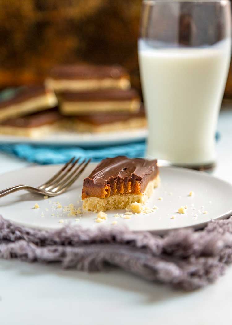 Millionaire Shortbread Bars with glass of milk