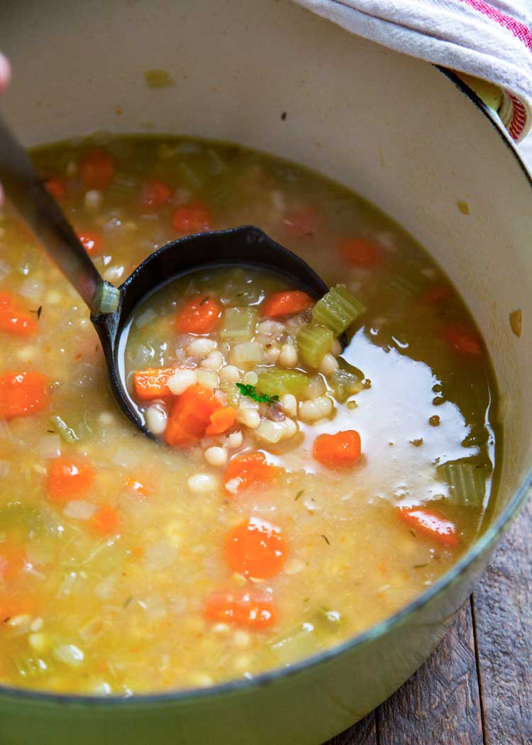 ladle in pot of navy bean soup