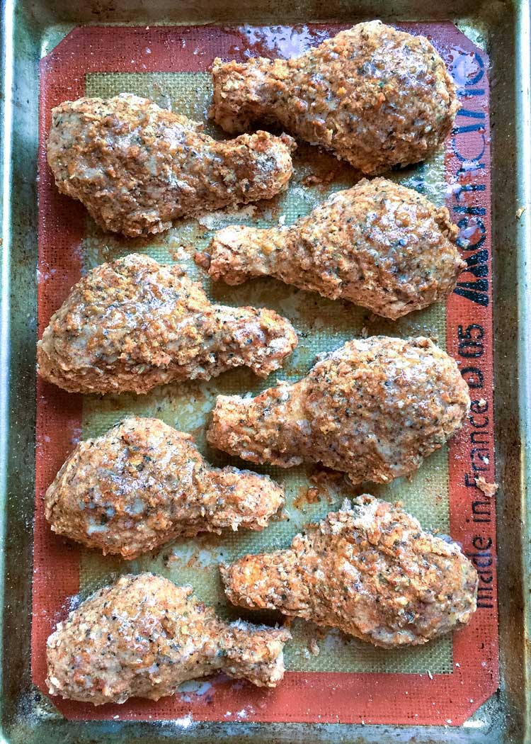 overhead photo of My Oven Fried Chicken is a KFC Copycat, is BAKED not fried, and has a fantastic flavor and crunch. What more could you ask for in “fried chicken” without all the grease! keviniscooking.com