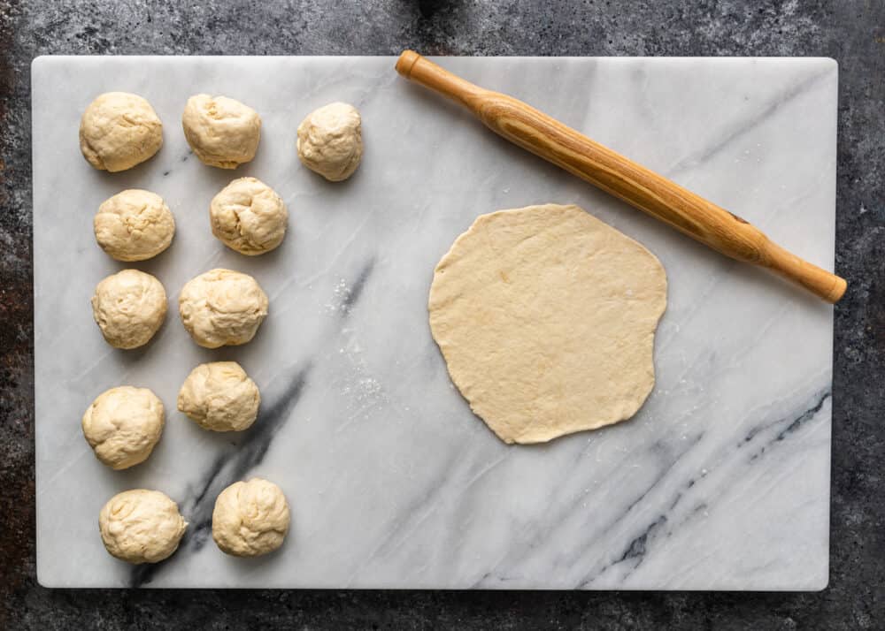 rolling out bread dough