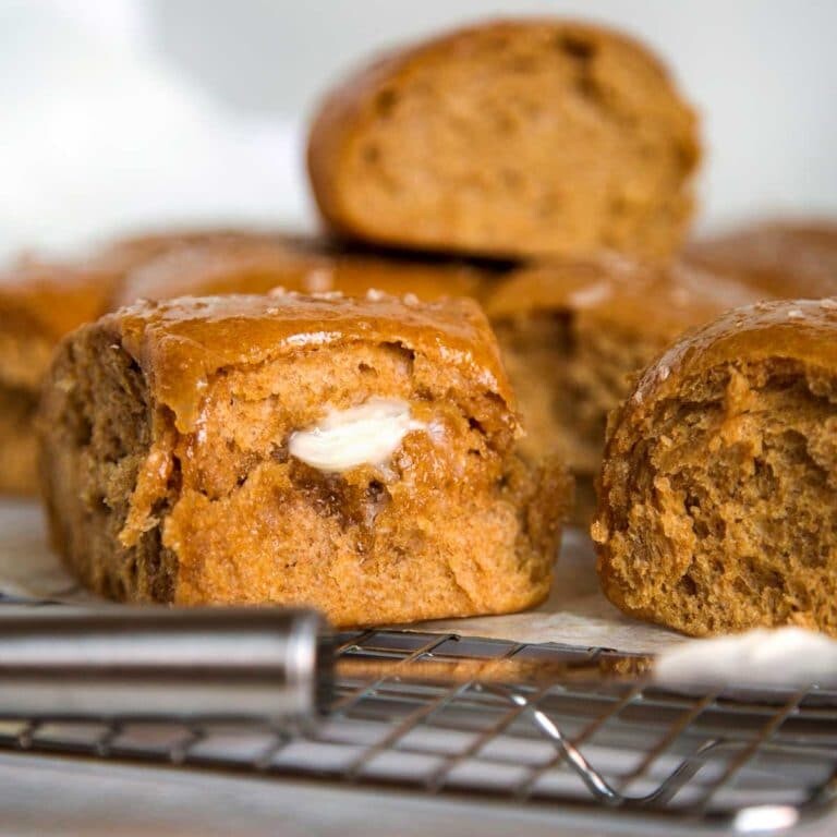 soft wheat homemade yeast rolls on wire cooling rack