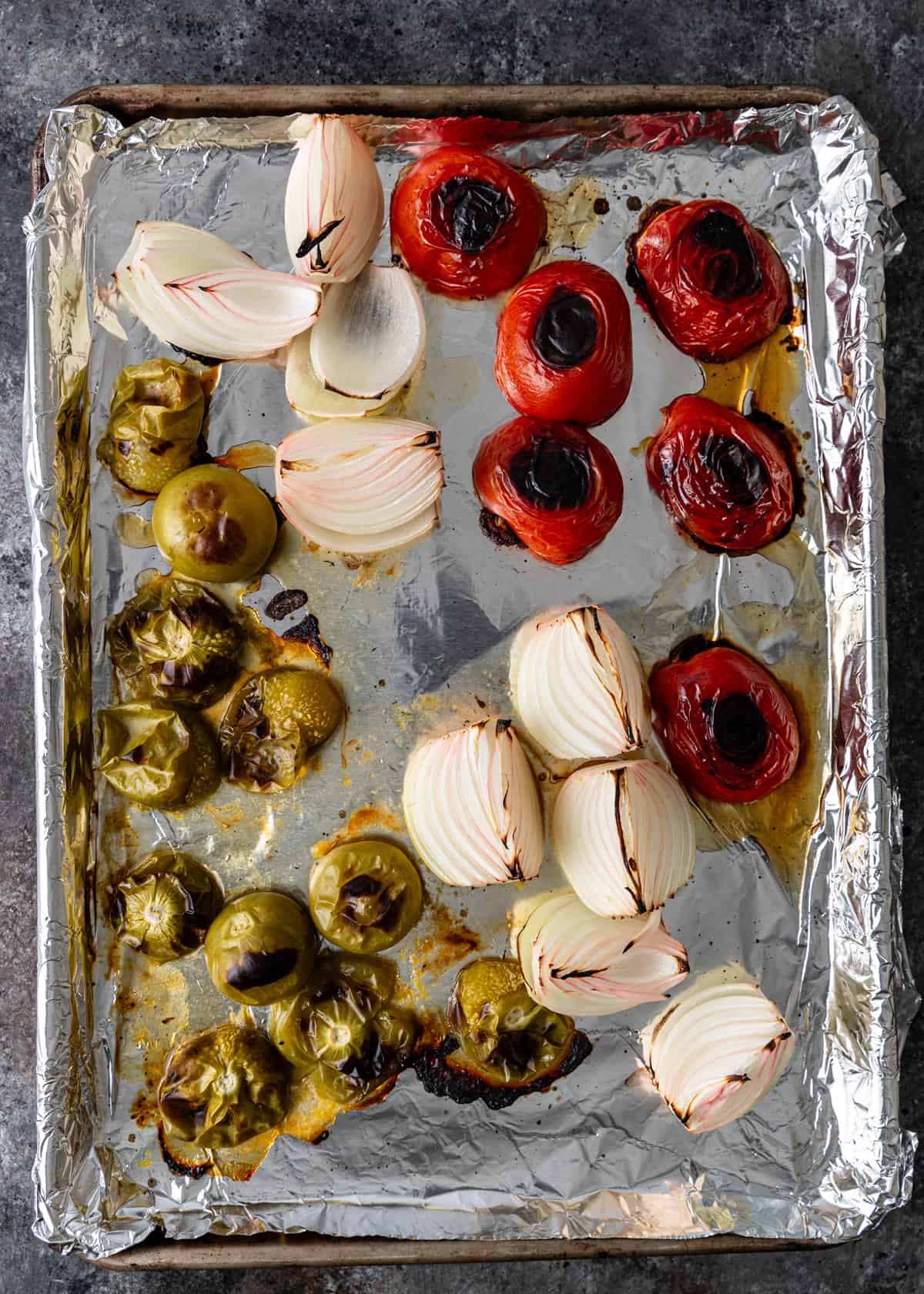 overhead process shot: roasted vegetables on a baking sheet