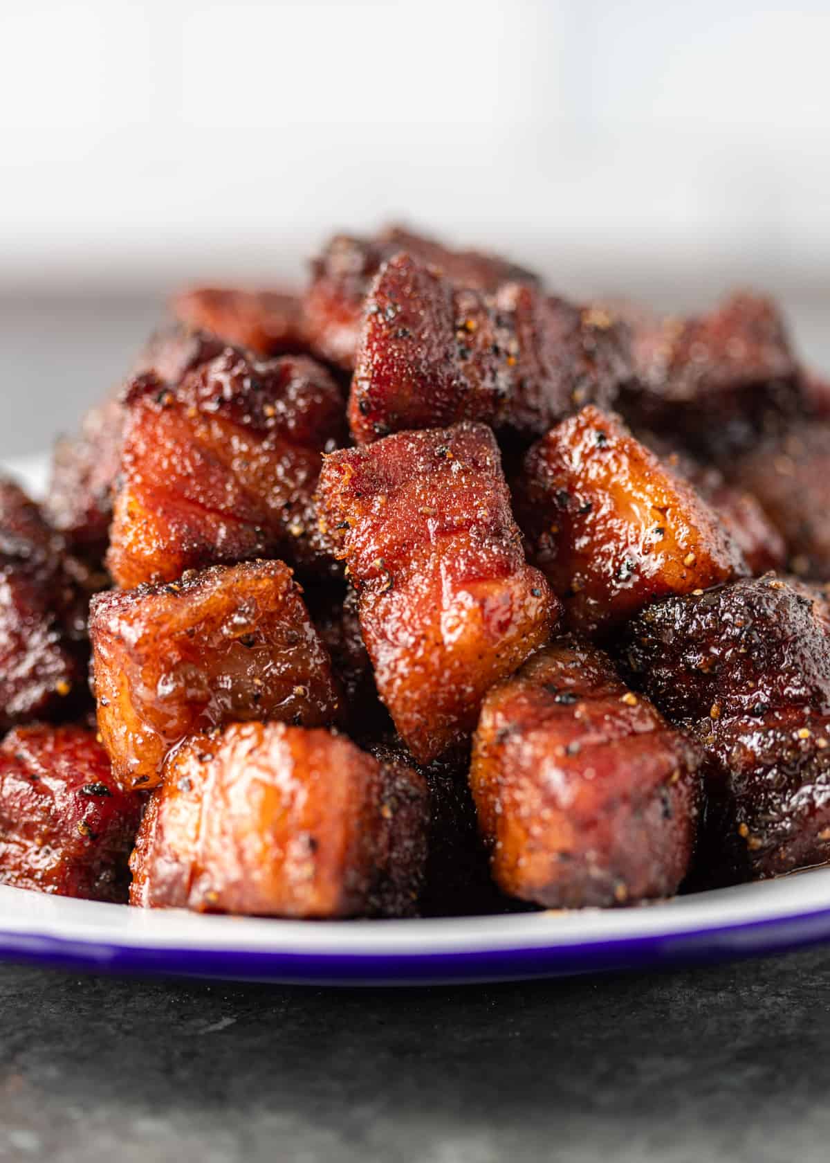 plate with a mound of Pork Belly Burnt Ends