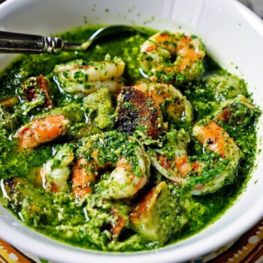 Portuguese Bread and Garlic Soup with Cilantro and Shrimp is beyond flavorful. This satisfying, rustic soup starts with a garlic, cilantro and serrano chile paste and when the shrimp is added makes for a filling, aromatic soup. www.keviniscooking.com