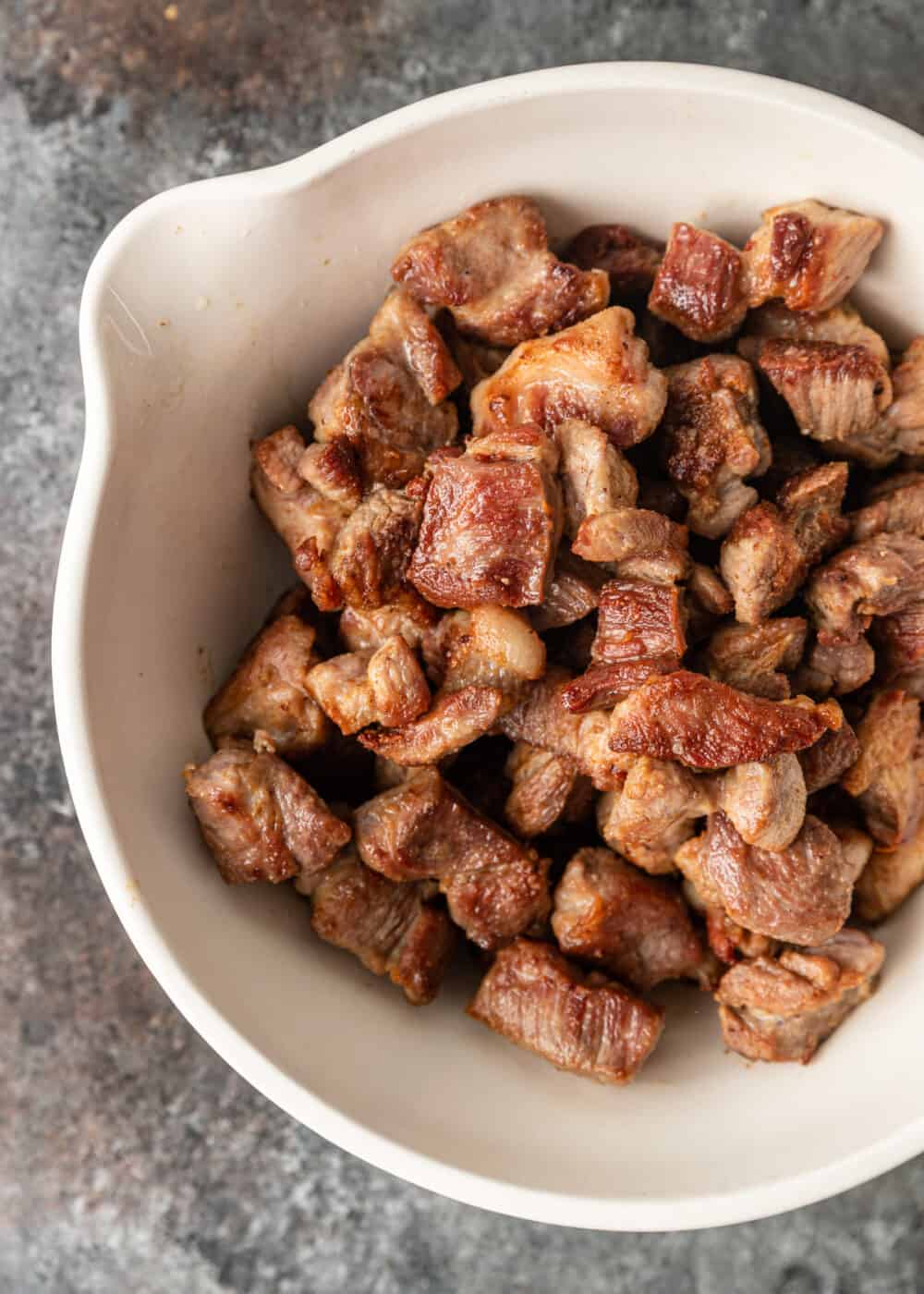 cooked pork in a bowl