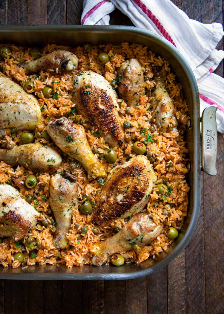 overhead closeup: a large baking dish full of Puerto Rican chicken and rice