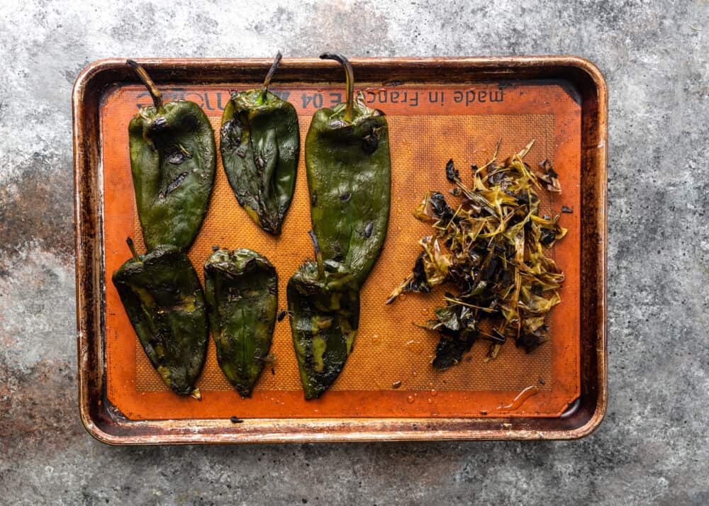 overhead image: roasting poblano peppers on baking sheet