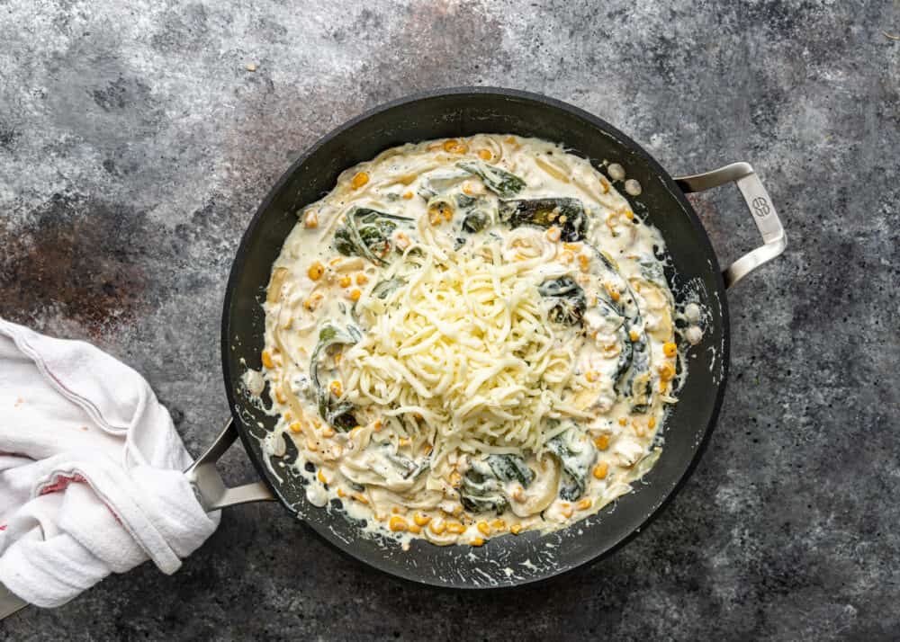 overhead image: poblano pepper recipe (Mexican side dish) in large skillet