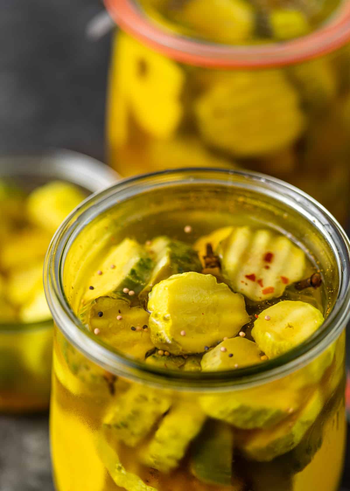 closeup: refrigerator pickles in a glass jar 