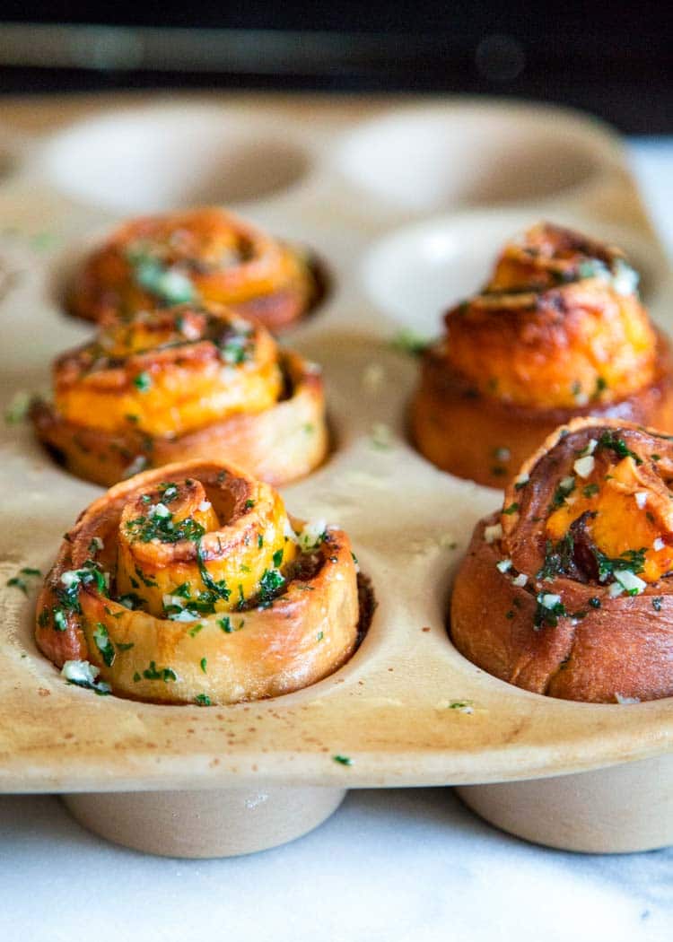 My baked rolled bread slathered with garlic parslet butter