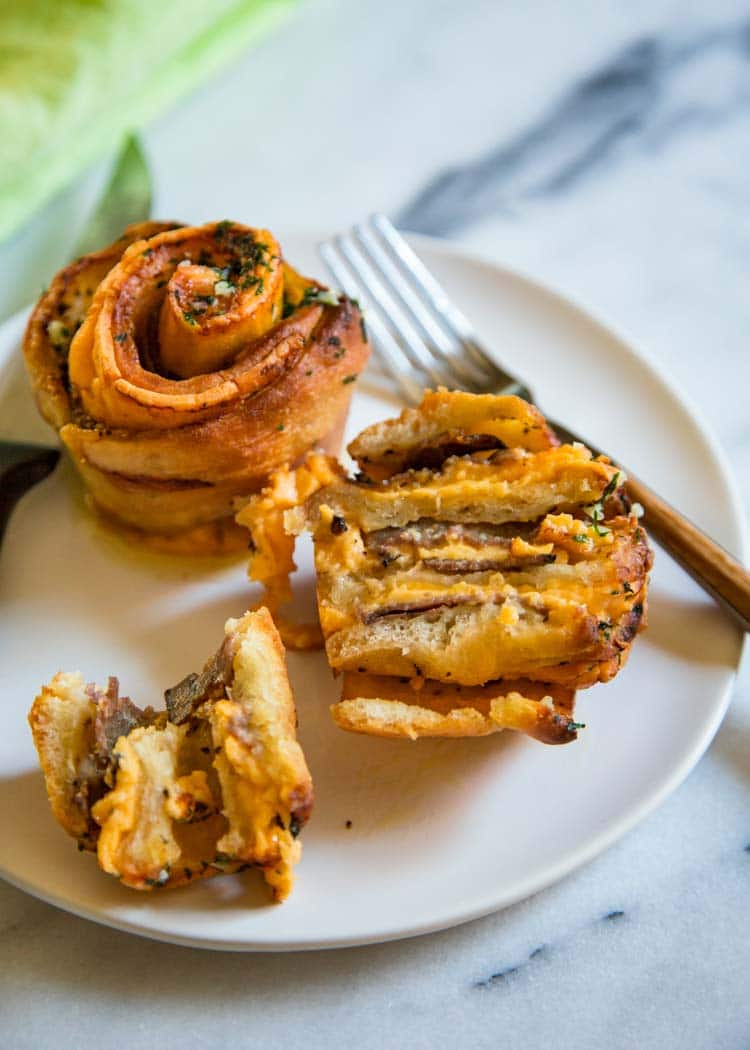 plate of sliced baked Roast Beef Cheddar Muffins