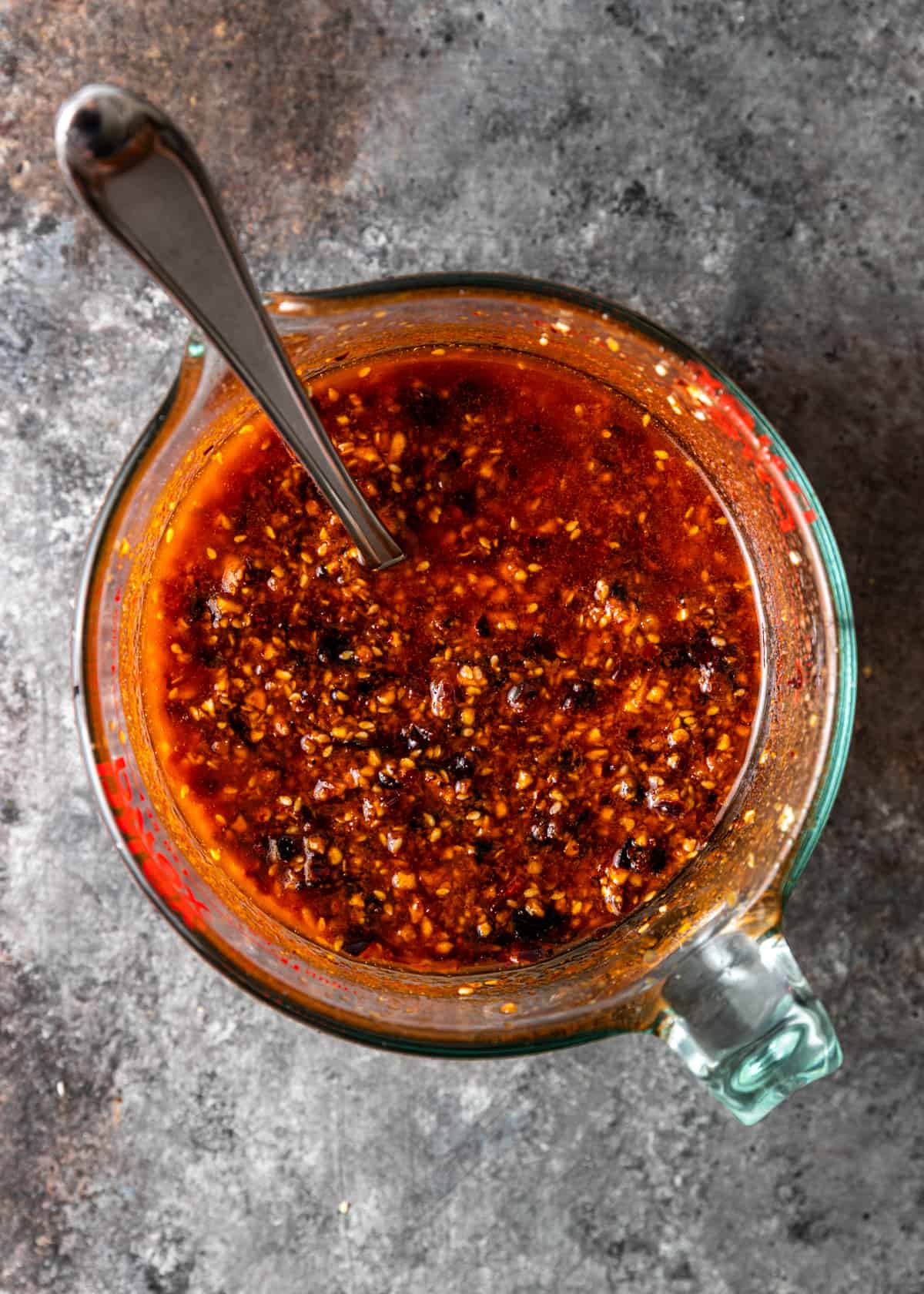 overhead shot of Salsa Macha in a measuring cup