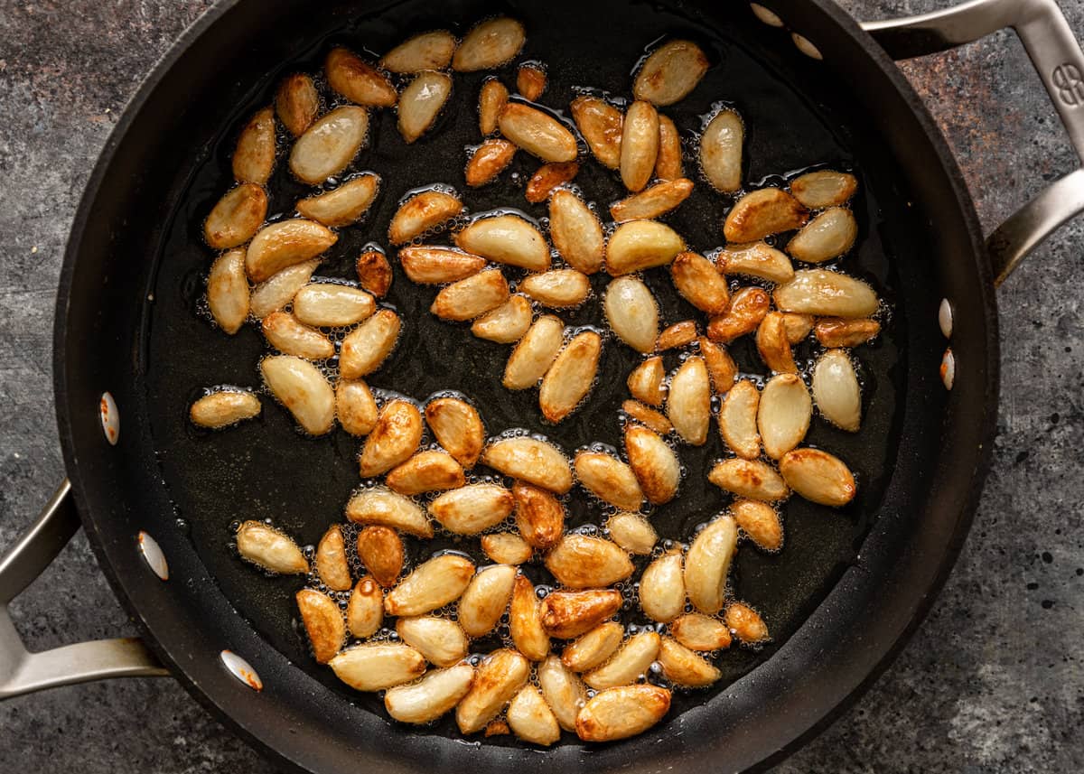 frying garlic in pan