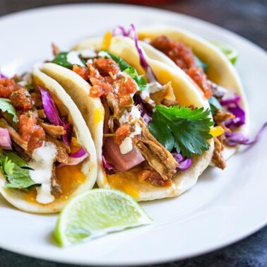 I make these Slow Cooker Flank Steak Street Tacos often and they are a great as a party appetizer or dinner for the family. Beyond flavorful, the shredded flank steak can be used in tacos or enchiladas. www.keviniscooking.com