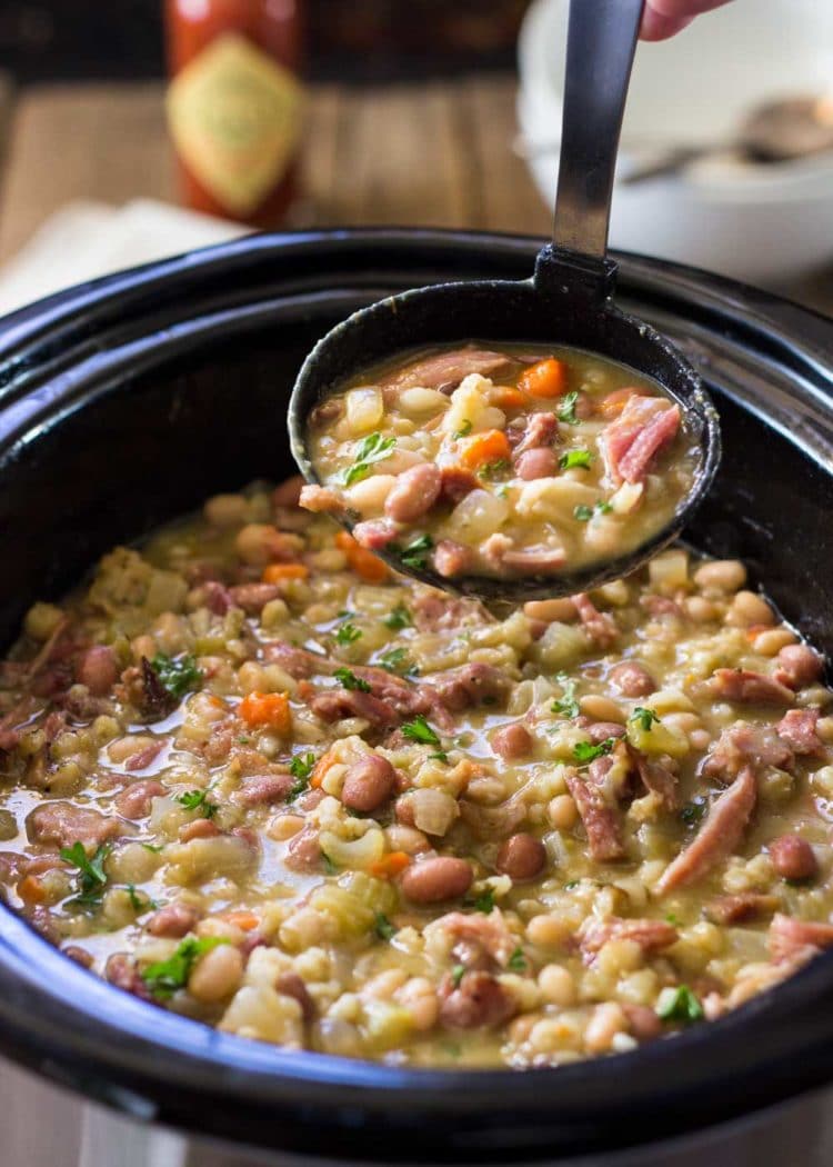 Slow Cooker Ham Bone Bean Soup in a ladle