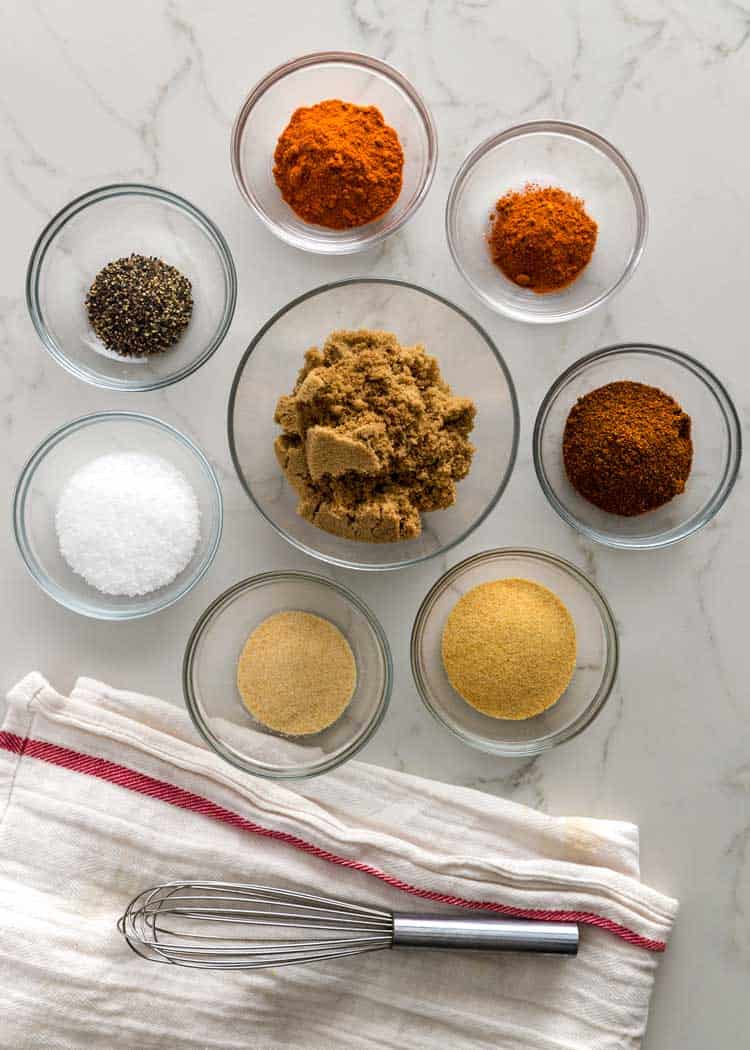 overhead shot of sweet pork dry rub spices in bowls