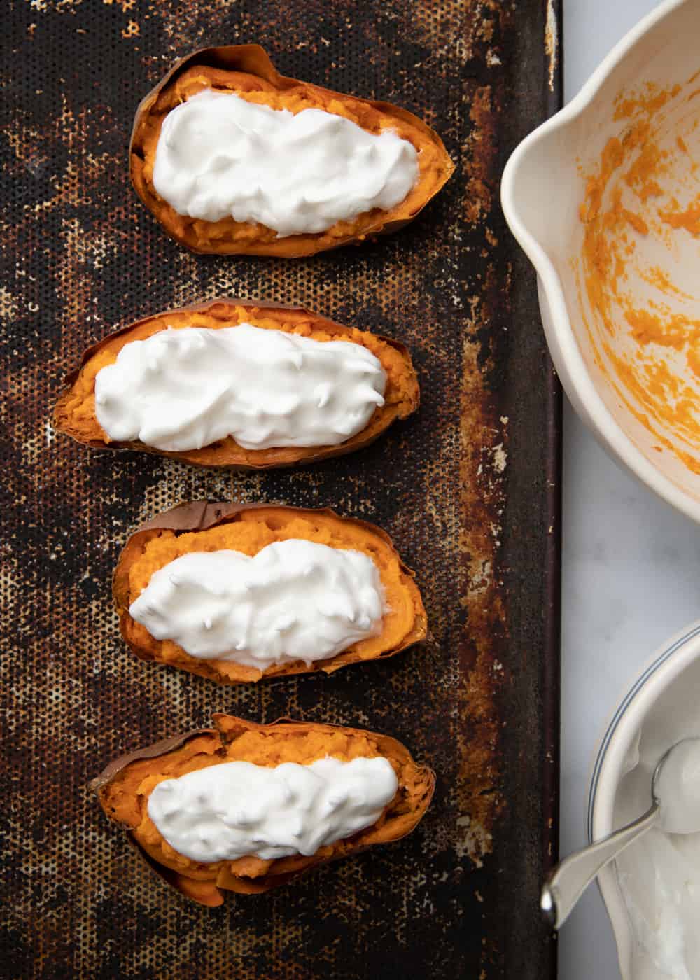 overhead: filling sweet potatoes with meringue