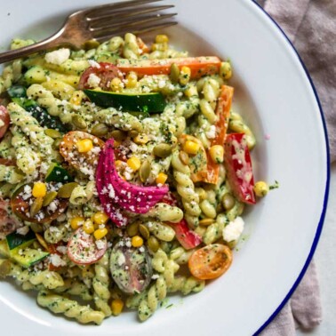 This Summer Pasta Salad has an incredible Cilantro Ranch dressing and lots of fresh vegetables, nuts and cheese, too. Add rotisserie chicken if you like.