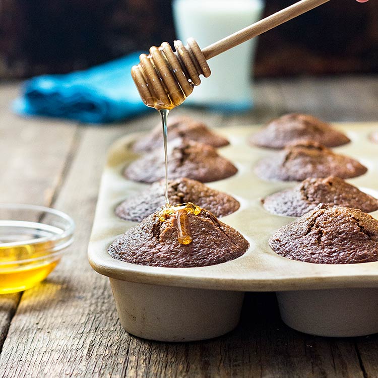 These Super Moist Buttermilk Bran Muffins are dense, great for breakfast with coffee and some fruit. Drizzle honey on top! Buttermilk and Apple Butter are the secret! keviniscooking.com